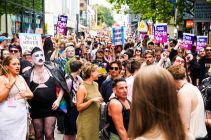 A crowd of Trans, non-binary people and allies waiting to start the march from 2024